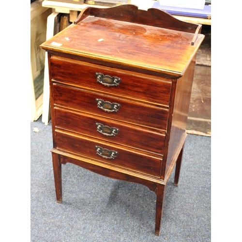 581 - Mahogany four drawer music cabinet.