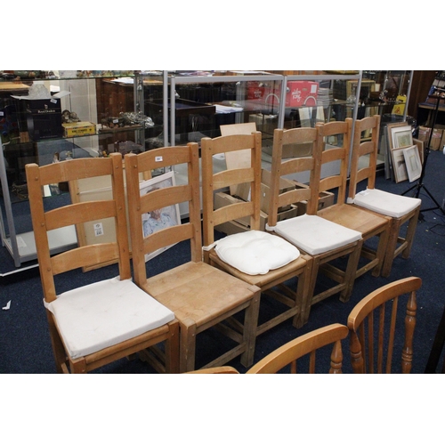 589 - Set of six oak kitchen chairs with ladder back.