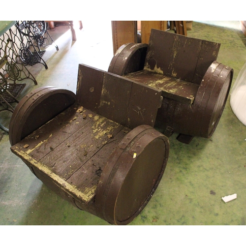 522 - Pair of whisky barrels converted into chairs, 88cm wide.