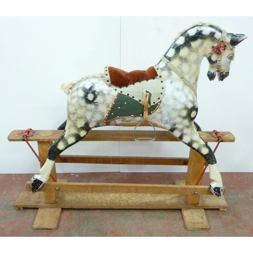 344 - Dapple grey painted rocking horse in the manner of Haddon, with horse hair mane, fixed to a wooden c... 