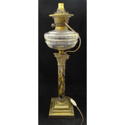 387 - British-made oil lamp, c. early 20th century, with glass reservoir above a Corinthian-type brass mou... 