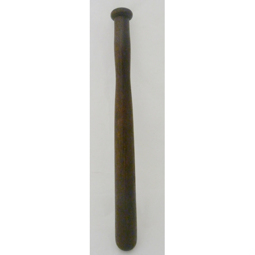 391 - Two late Victorian truncheons, in oak and walnut, one with leather strap, 39cm long.  (2)