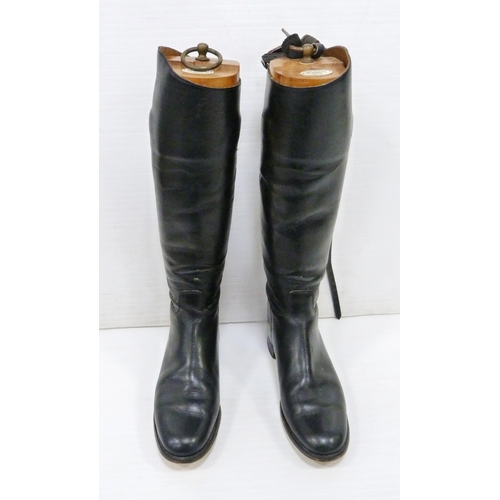 411 - Pair of black leather riding boots with wooden trees and ring pull handle, label for 'Alan McAfee, 3... 