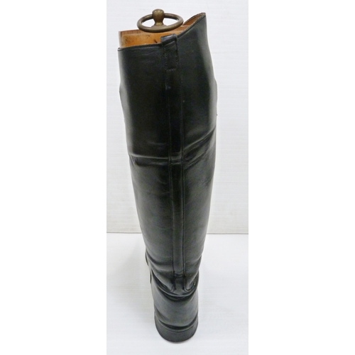 411 - Pair of black leather riding boots with wooden trees and ring pull handle, label for 'Alan McAfee, 3... 