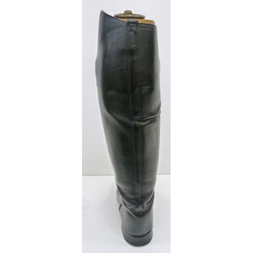 411 - Pair of black leather riding boots with wooden trees and ring pull handle, label for 'Alan McAfee, 3... 