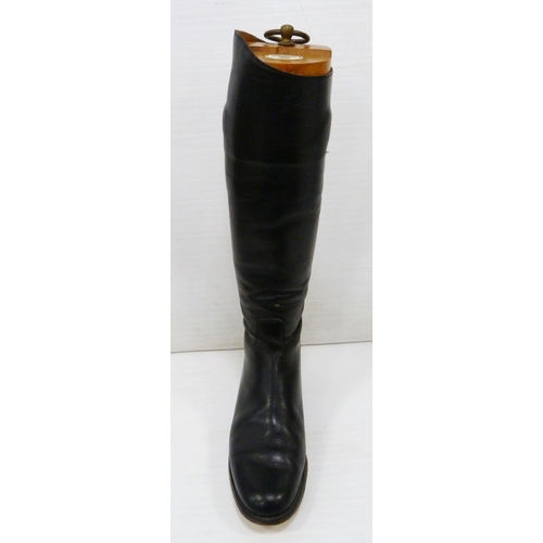 411 - Pair of black leather riding boots with wooden trees and ring pull handle, label for 'Alan McAfee, 3... 