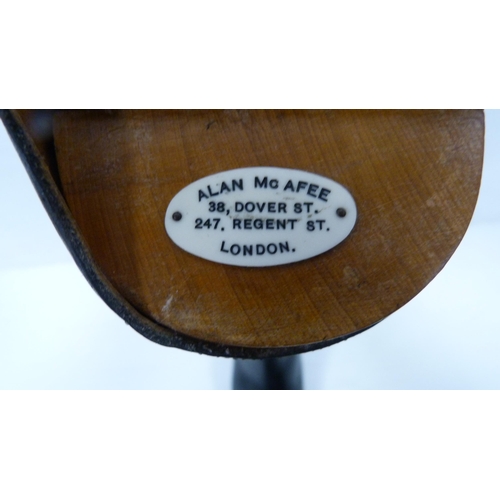 411 - Pair of black leather riding boots with wooden trees and ring pull handle, label for 'Alan McAfee, 3... 