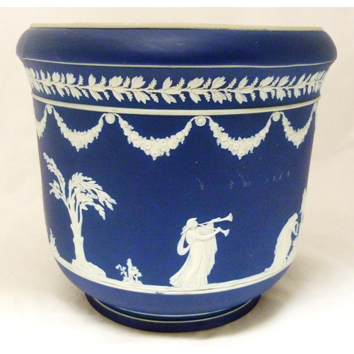 309 - Wedgwood blue Jasper ware jardinière with relief decoration of classical figures and fruiting... 