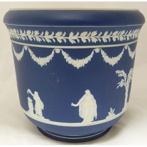 309 - Wedgwood blue Jasper ware jardinière with relief decoration of classical figures and fruiting... 