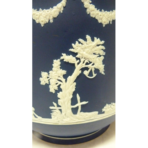 309 - Wedgwood blue Jasper ware jardinière with relief decoration of classical figures and fruiting... 