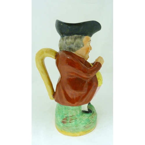 312 - Victorian Staffordshire pottery toby jug modelled as 'The Snuff Taker', in bright glazed colours, 26... 