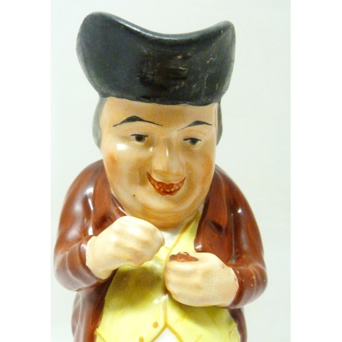 312 - Victorian Staffordshire pottery toby jug modelled as 'The Snuff Taker', in bright glazed colours, 26... 