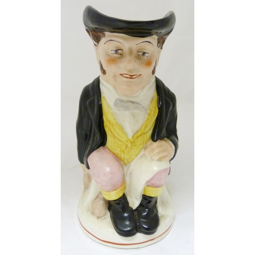 312 - Victorian Staffordshire pottery toby jug modelled as 'The Snuff Taker', in bright glazed colours, 26... 