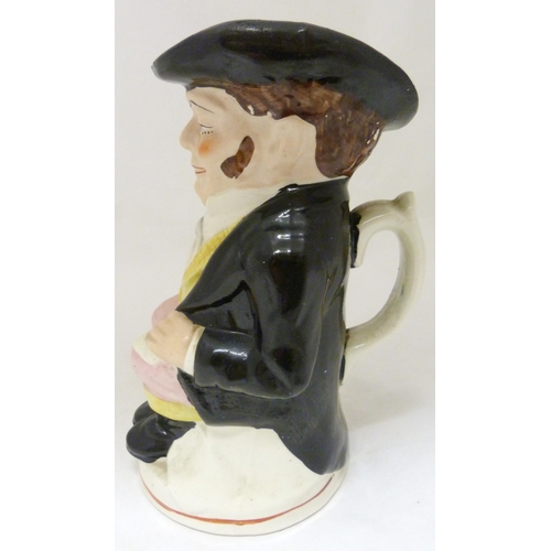 312 - Victorian Staffordshire pottery toby jug modelled as 'The Snuff Taker', in bright glazed colours, 26... 