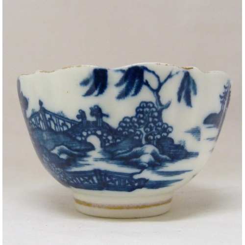 317 - Two 18th century Caughley blue and white porcelain tea bowls, both bearing Chinese garden patterns, ... 