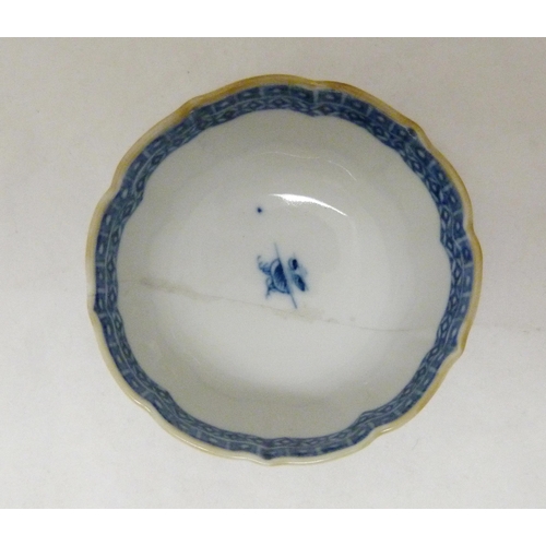 317 - Two 18th century Caughley blue and white porcelain tea bowls, both bearing Chinese garden patterns, ... 