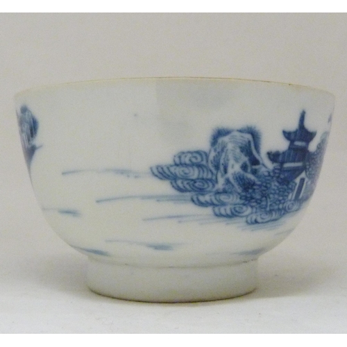 317 - Two 18th century Caughley blue and white porcelain tea bowls, both bearing Chinese garden patterns, ... 