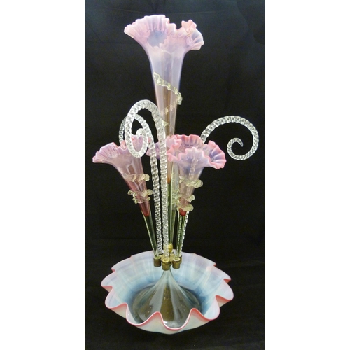 334 - Victorian vaseline and tinted glass flower epergne with four cranberry-tinted glass trumpets flanked... 