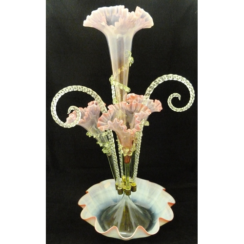 334 - Victorian vaseline and tinted glass flower epergne with four cranberry-tinted glass trumpets flanked... 