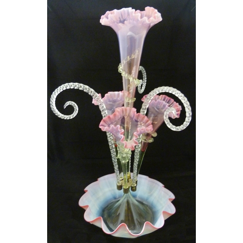 334 - Victorian vaseline and tinted glass flower epergne with four cranberry-tinted glass trumpets flanked... 