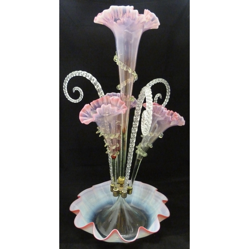 334 - Victorian vaseline and tinted glass flower epergne with four cranberry-tinted glass trumpets flanked... 