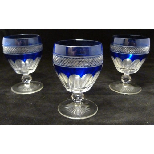 337 - Set of six St Louis Trianon cobalt blue and clear cut crystal wine glasses, 20th century, with dimpl... 