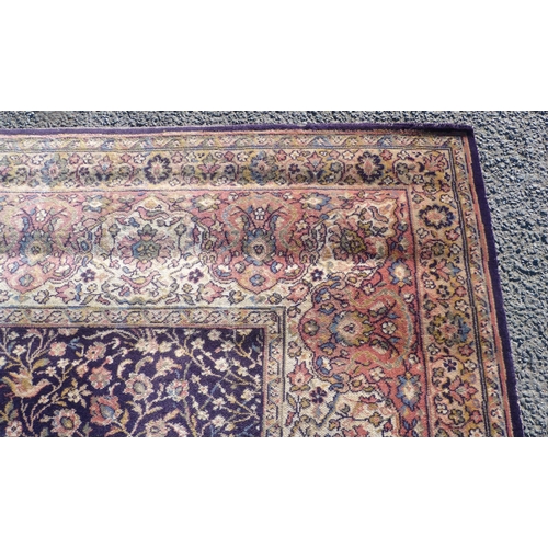 498 - Wilton-style carpet in the Islamic Garden design, with red and cream field on a blue ground, 367cm x... 