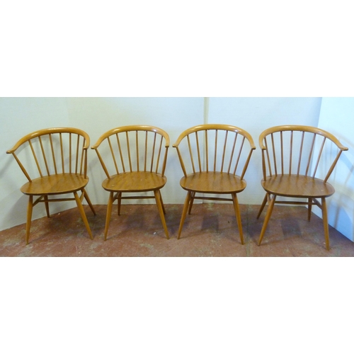 536 - Set of four mid-century Ercol elm and beech 'Cowhorn' chairs with stick backs, stamped to the unders... 