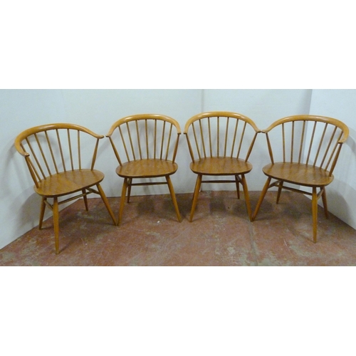 536 - Set of four mid-century Ercol elm and beech 'Cowhorn' chairs with stick backs, stamped to the unders... 