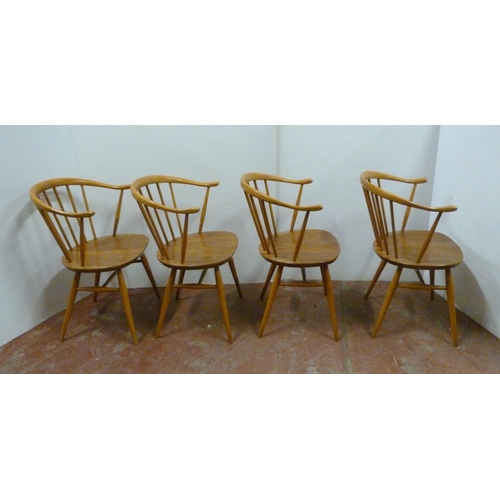 536 - Set of four mid-century Ercol elm and beech 'Cowhorn' chairs with stick backs, stamped to the unders... 