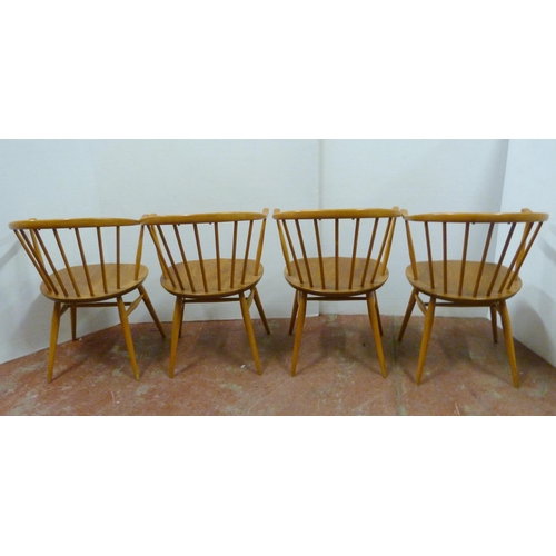 536 - Set of four mid-century Ercol elm and beech 'Cowhorn' chairs with stick backs, stamped to the unders... 