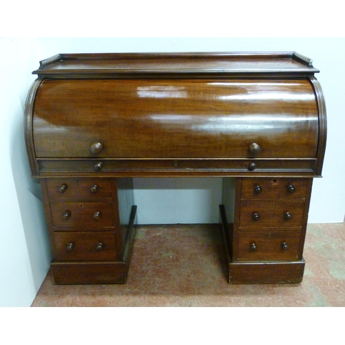 539 - Victorian mahogany cylinder desk, the fall front enclosing bird's eye maple-lined drawers and pigeon... 