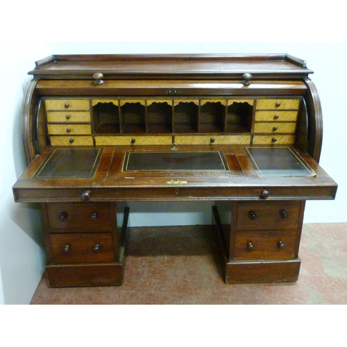 539 - Victorian mahogany cylinder desk, the fall front enclosing bird's eye maple-lined drawers and pigeon... 