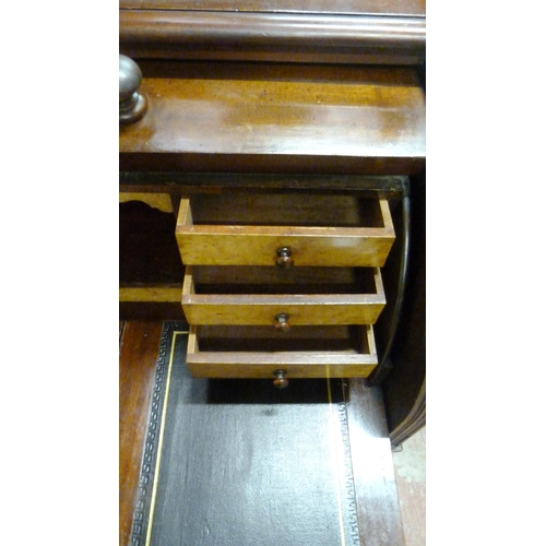 539 - Victorian mahogany cylinder desk, the fall front enclosing bird's eye maple-lined drawers and pigeon... 