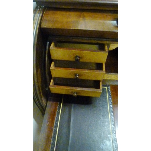 539 - Victorian mahogany cylinder desk, the fall front enclosing bird's eye maple-lined drawers and pigeon... 