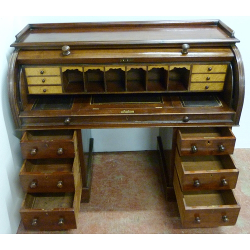 539 - Victorian mahogany cylinder desk, the fall front enclosing bird's eye maple-lined drawers and pigeon... 