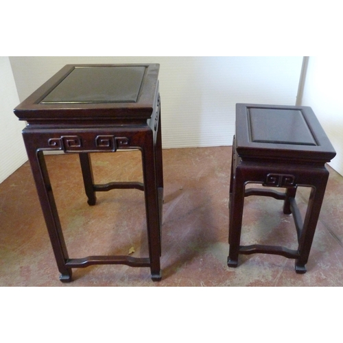 541 - Chinese-style quartetto nest of four graduated hardwood tables of reddish patina, the largest 66cm h... 