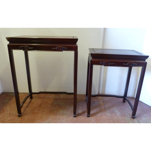 541 - Chinese-style quartetto nest of four graduated hardwood tables of reddish patina, the largest 66cm h... 