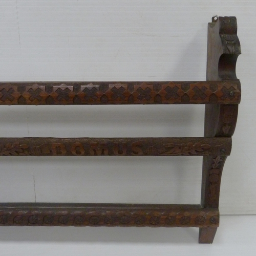 542 - Scottish carved oak Delft rack with two open shelves, carved to the back stretchers and supports wit... 