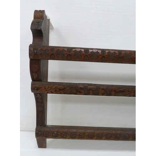 542 - Scottish carved oak Delft rack with two open shelves, carved to the back stretchers and supports wit... 