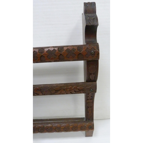 542 - Scottish carved oak Delft rack with two open shelves, carved to the back stretchers and supports wit... 