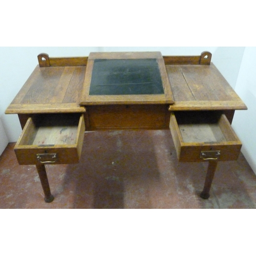 544 - Arts & Crafts oak writing desk, c. 1930s, with hinged writing flap to the top above two short dr... 