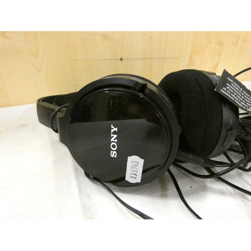 242 - Set of Sony wireless headphones and charger.