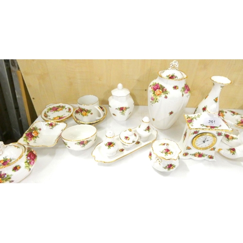 261 - Collection of Royal Albert Country Rose to include cruet set, clock, preserve pots, two glass bowls ... 