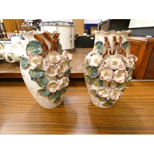 296 - Pair of floral Studio pottery vases.