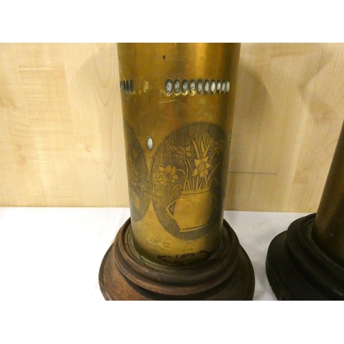 320 - Two large brass trench art vases.