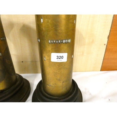 320 - Two large brass trench art vases.