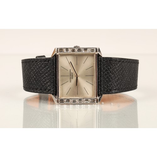 119A - Patek Philippe 18ct white gold wrist watch with baguette diamond bezel on a black leather strap, cas... 