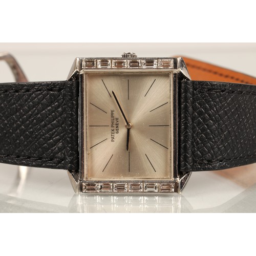 119A - Patek Philippe 18ct white gold wrist watch with baguette diamond bezel on a black leather strap, cas... 