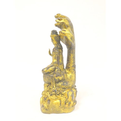 233 - Tibetan gilt bronze Guanyin Naga figure with five cobra aureole, bearing six character inscription m... 